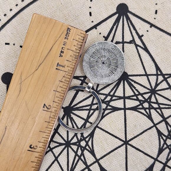 Cheshire cat smile, we are all made here glow in the dark keychain - Picture 7 of 7